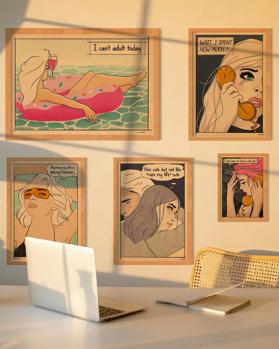 Stylish home office wall decorated with retro pop art posters from the Soft Pop Studio™ collection by Cha, featuring comic-style female portraits and humorous quotes like ‘I can’t adult today’ and ‘He’s cute but not ruin my life cute.’