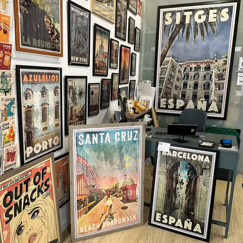 Oversized 5XL travel poster of Sitges, Spain displayed without glass on a glass wall inside the Myretroposter gallery.