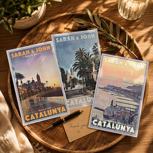 Three personalized wedding postcards inspired by vintage travel posters, created for Sarah and John’s Sitges wedding and presented on a wooden tray.