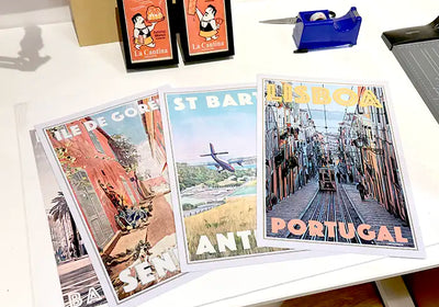 Limited edition travel posters by Alecse and Cha presented inside the MyRetroPoster Sitges gallery.