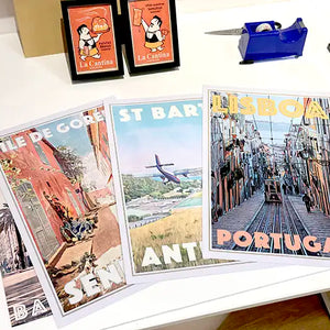 Limited edition travel posters by Alecse and Cha presented inside the MyRetroPoster Sitges gallery.