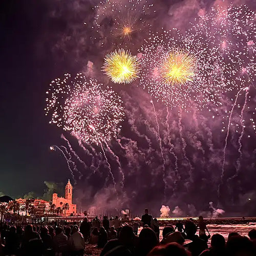 Fireworks illuminating the skyline of Sitges during the Festa Major celebrations, one of the town’s most important cultural traditions.
