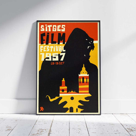 Sitges Fantastic Film Festival poster and postcard by Cha x Spanish Capsule™ on a white wooden floor