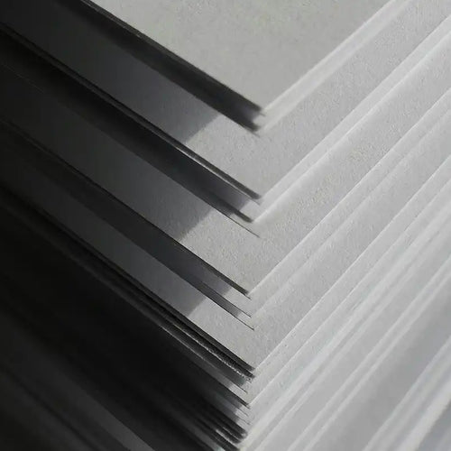 Close-up of a pile of Art paper