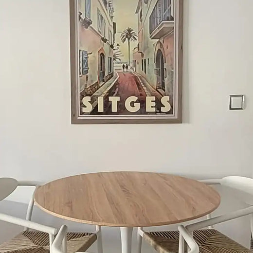 Sitges Poster La Carreta by Alecse displayed in an Airbnb living room