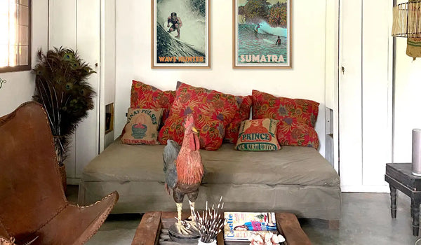 2 surf posters in a Balinese interior from Myretroposter's Surf poster collection