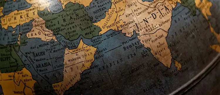 Close-up of a vintage world globe symbolizing travel and exploration — main visual for MyRetroposter’s country travel poster collections.