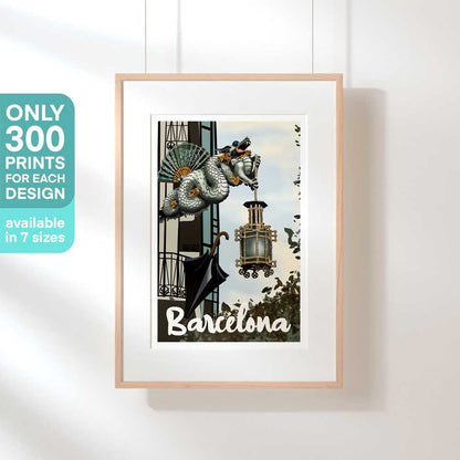 Barcelona Dragon retro poster hanging in a wooden frame, showcasing the intricate Art Nouveau dragon and lantern on La Rambla