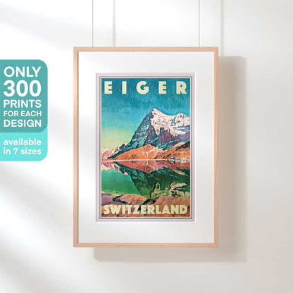 Framed vintage travel poster of the Eiger mountain in Switzerland, suspended on a white wall. Only 300 prints available, limited edition in 7 sizes