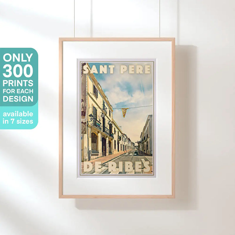 Ribes Catalunya vintage travel poster by Alecse, framed on a wall, depicting the main street of Sant Pere de Ribes in soft retro tones