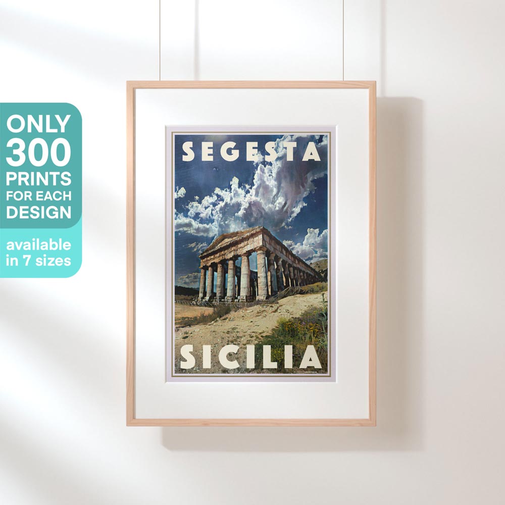 A framed Segesta Sicily vintage travel poster hanging on a wall, showcasing the Doric temple under dramatic clouds