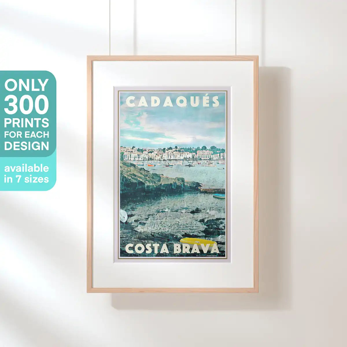 Framed Cadaqués Memories poster featuring the picturesque harbour and whitewashed houses of Cadaqués