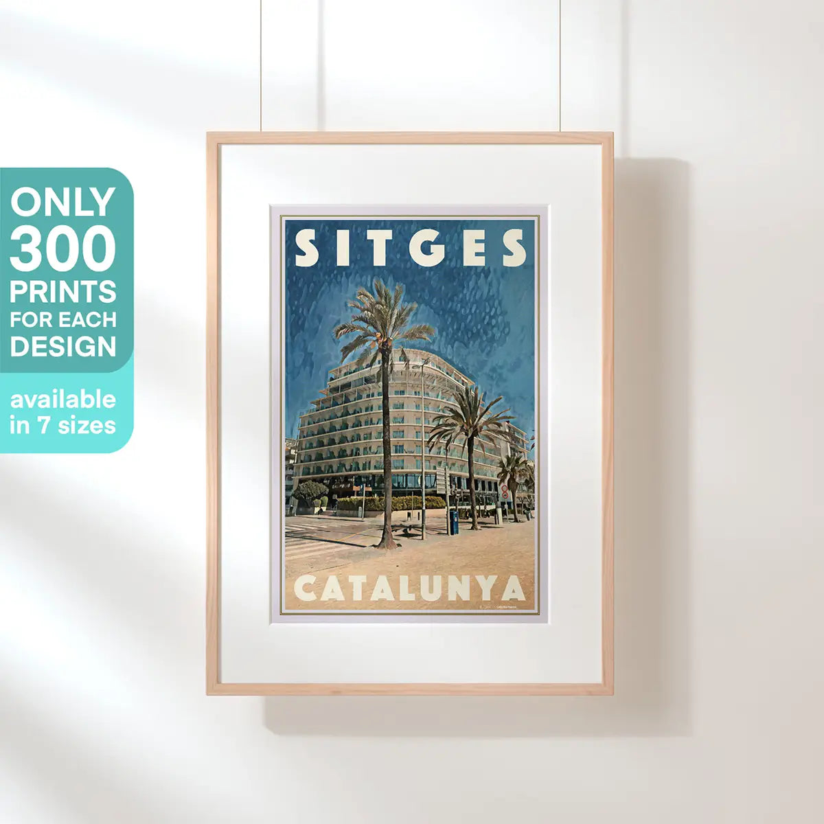 Passeig Marítim Poster Sitges by Alecse displayed in a natural wood frame, limited edition travel poster from Sitges Catalunya