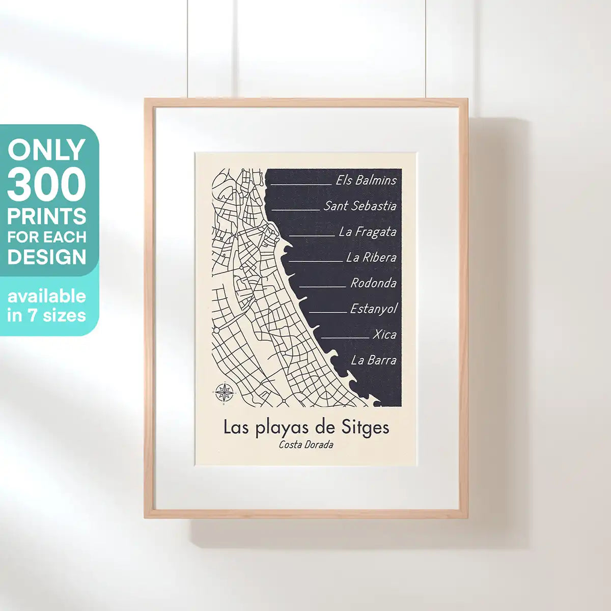 Framed Las Playas de Sitges minimalist map poster hanging on a wall with the “Only 300 Prints” limited edition message.