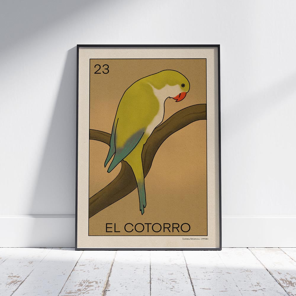 A framed Lotería Sitgetana poster featuring a vibrant parrot perched on a branch, designed in a bold, vintage-inspired style by Cha for the Spanish Capsule™ collection