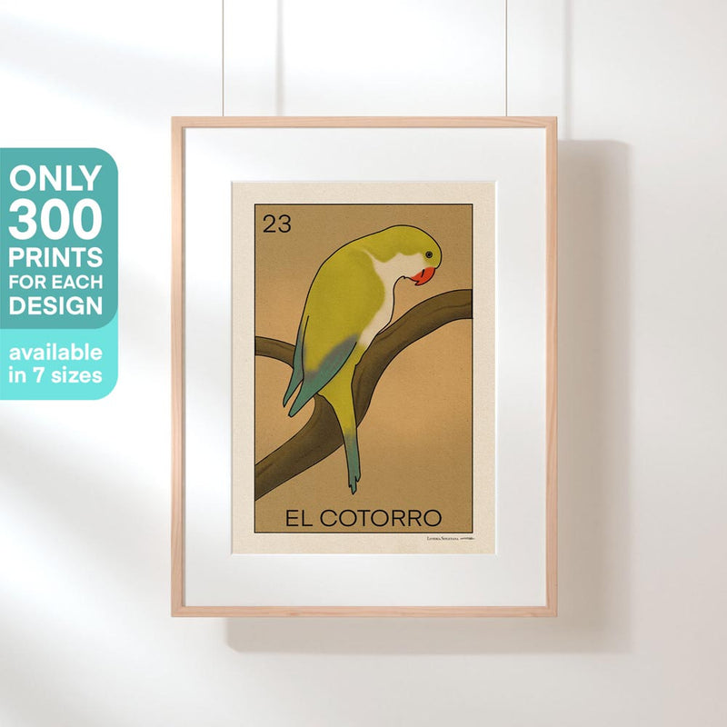 El Cotorro poster displayed in a light wooden frame, emphasizing its vintage charm and Mediterranean color palette, perfect for stylish and nature-inspired interiors.
