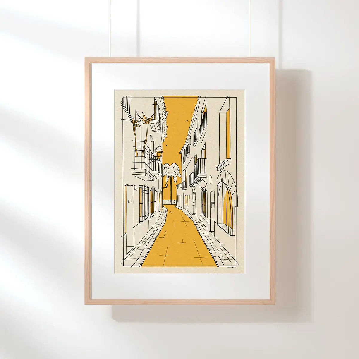 Framed Carrer de la Carreta Sitges poster from the City Lines collection showing the iconic narrow street lined with balconies and Mediterranean architecture