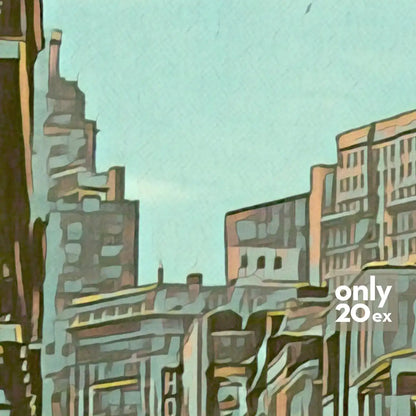 Detailed view of French Quarter buildings and sky in soft pastel tones.