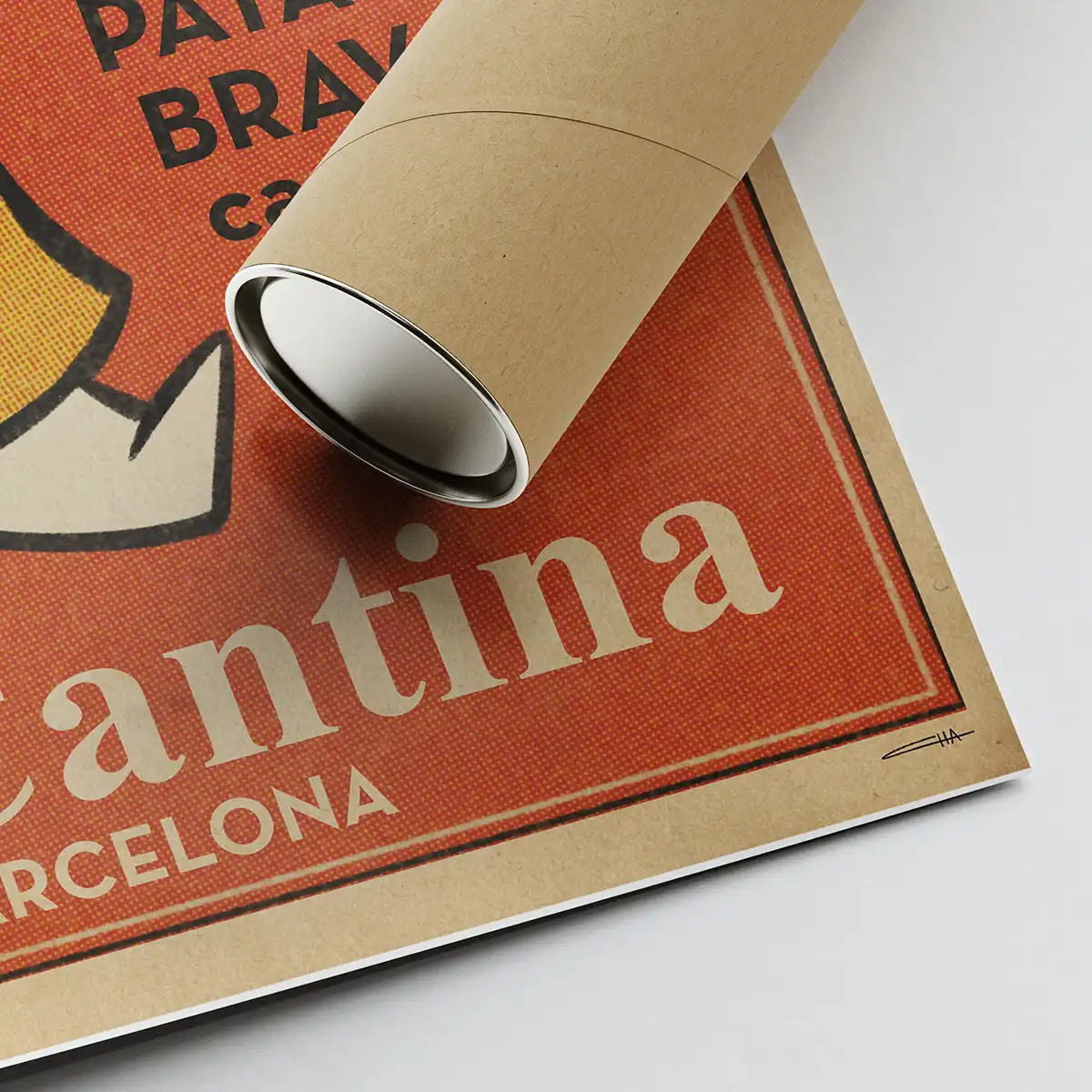 Corner of La Cantina Bravas poster showing artist Cha’s signature and cardboard tube used for eco shipping