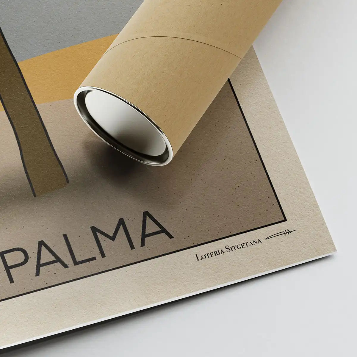 Close-up of the signature of La Palma art print by Cha rolled next to an eco-friendly shipping tube – Lotería Sitgetana series