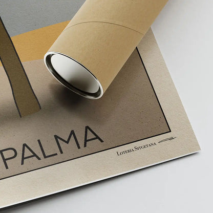 Close-up of the signature of La Palma art print by Cha rolled next to an eco-friendly shipping tube – Lotería Sitgetana series