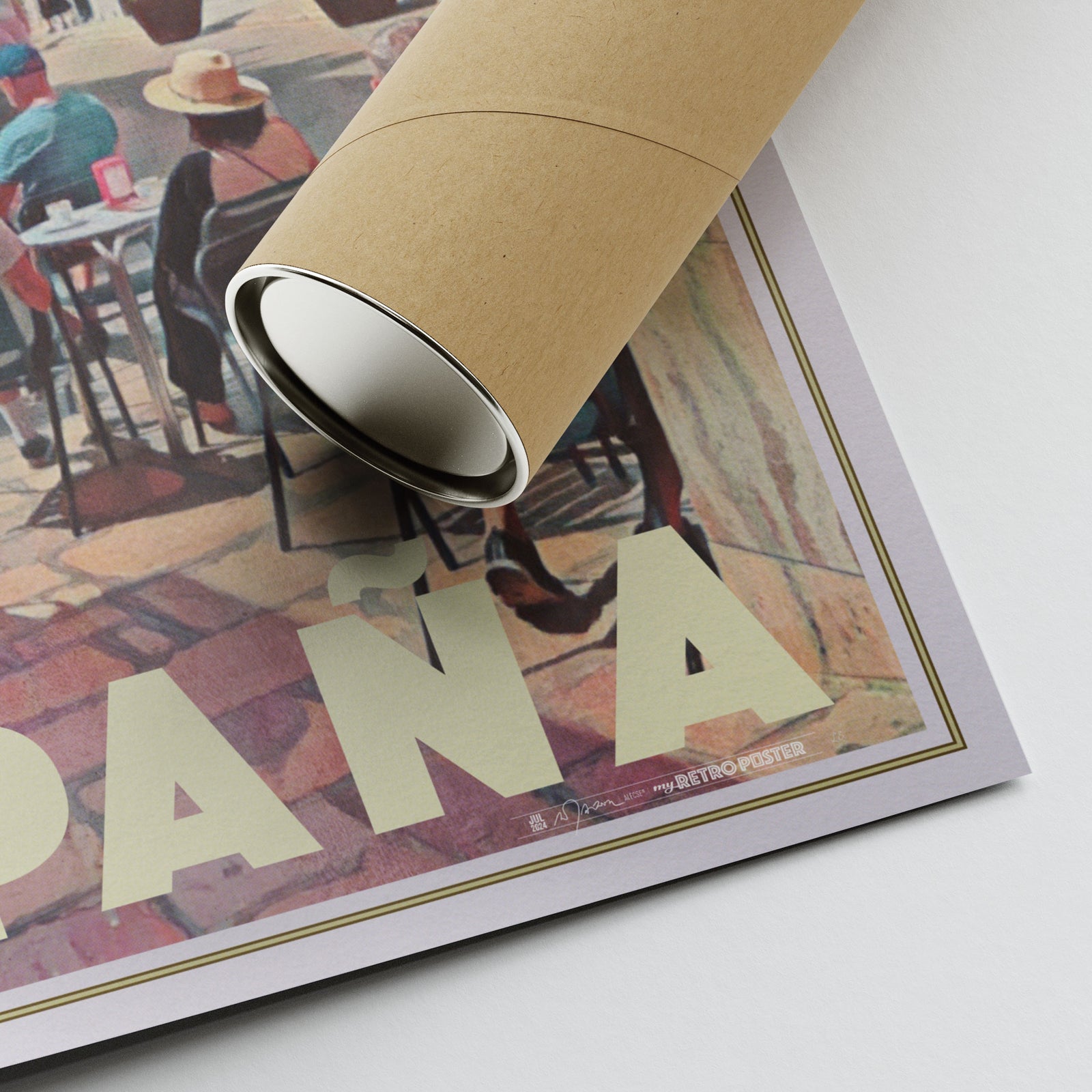 Close-up of the Sitges Café poster edge with printed signature beside an eco-friendly cardboard shipping tube.