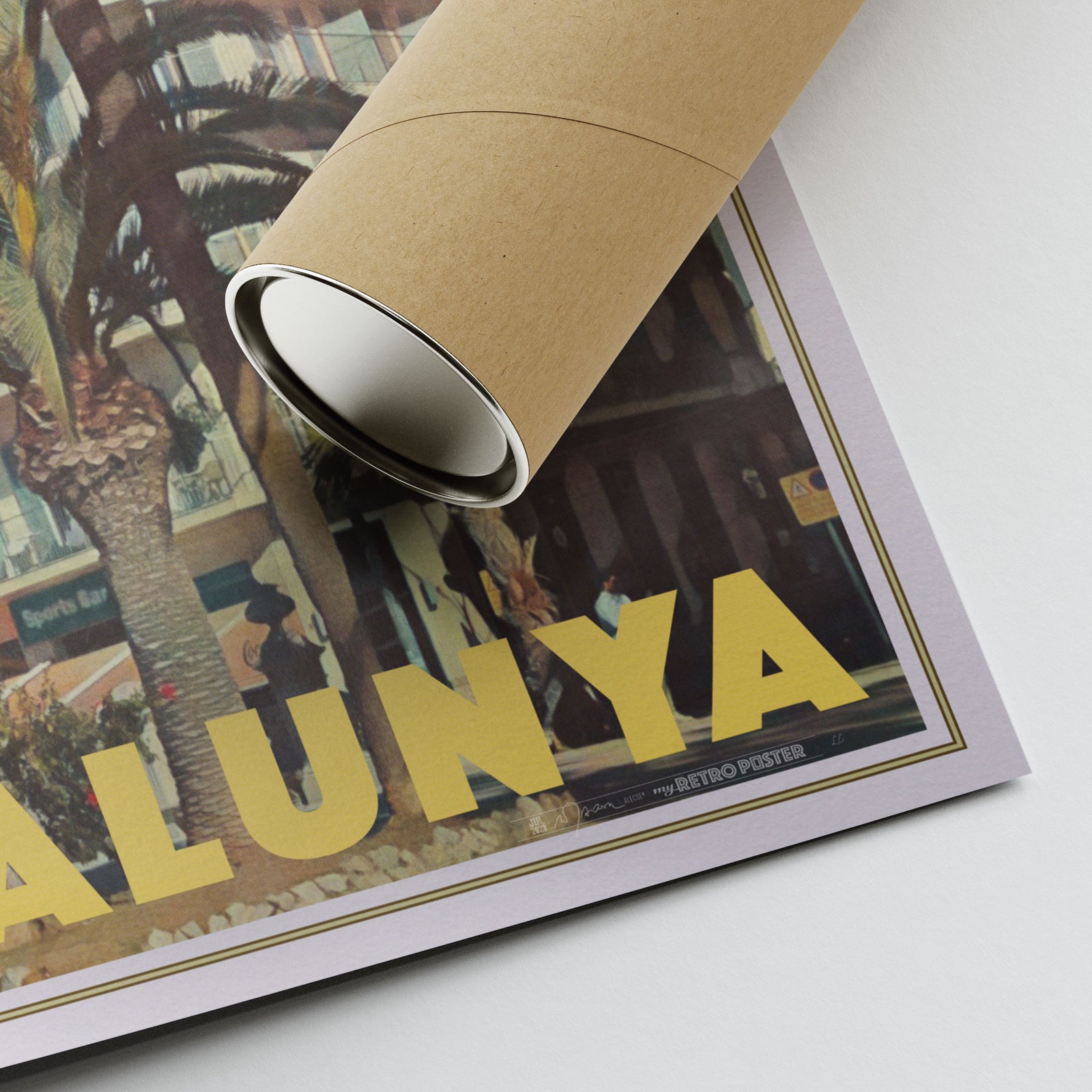 Corner of Alecse’s Hotel Subur Sitges poster showing artist signature and eco-friendly packaging tube for transportation.