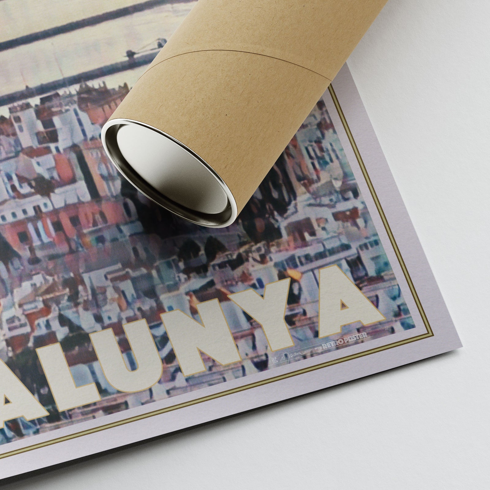 Corner of Alecse’s Sitges Sunrise poster showing artist signature and eco-friendly tube packaging.