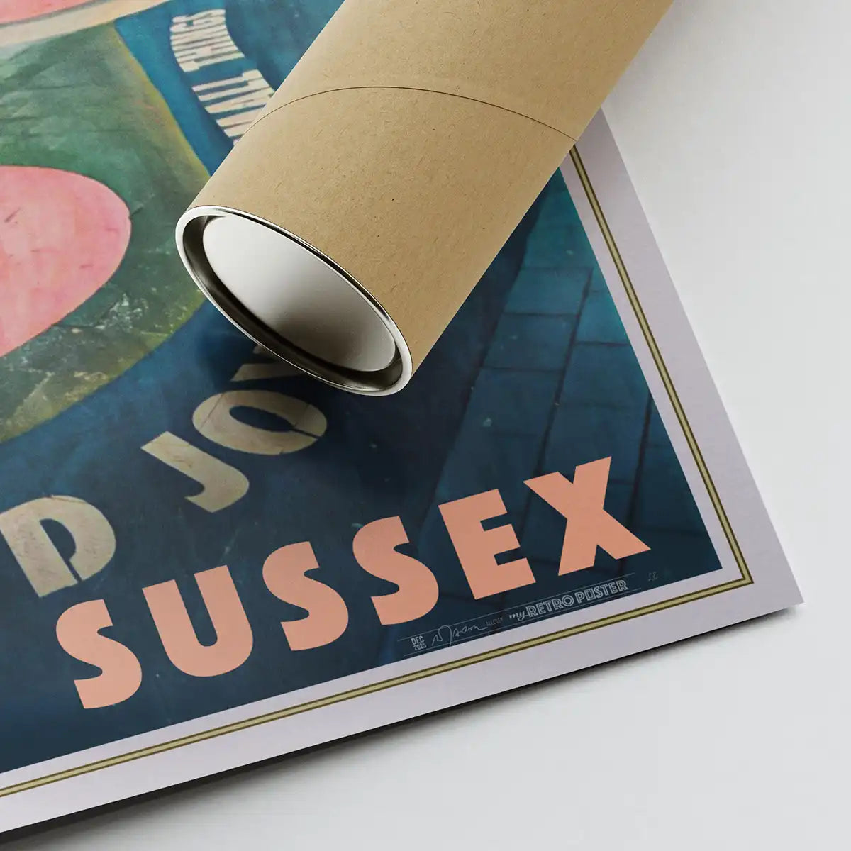 Corner of the Brighton Find Joy vintage travel poster by Alecse featuring the artist signature and a shipping tube