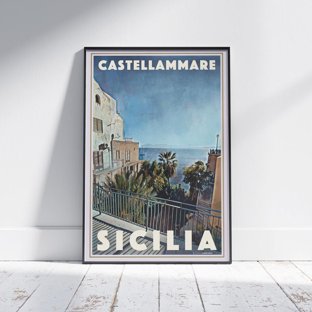Castellammare poster framed and leaning against a white wall with wooden floor