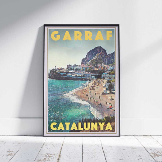 Garraf Beach Catalunya travel poster in a frame on a white wooden floor.