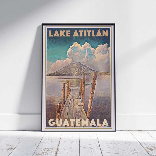 Poster Displayed on the Floor – The framed Lake Atitlan Poster, leaning against a wall, showcasing the natural beauty of the lake surrounded by volcanoes