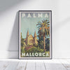 Palma Cathedral travel poster framed on a white wooden floor, showcasing Alecse’s limited-edition design of Mallorca’s iconic landmark