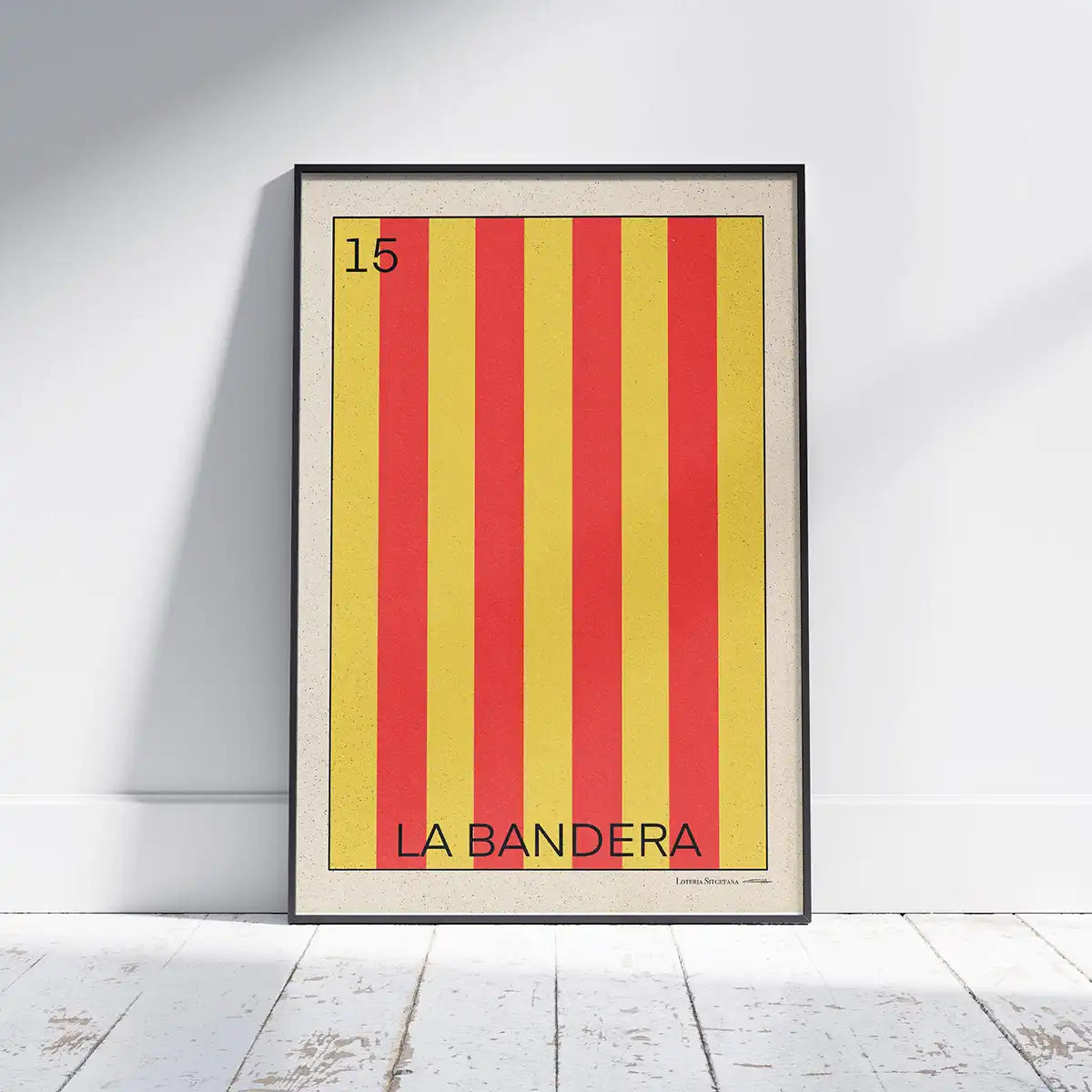 Framed La Bandera poster from the Spanish Capsule by Cha, shown on a white wooden floor with bold red and yellow stripes
