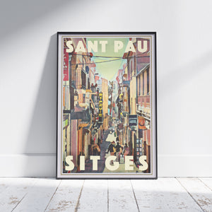 Framed Sant Pau Sitges poster by Alecse depicting the lively Mediterranean street scene in vintage tones.