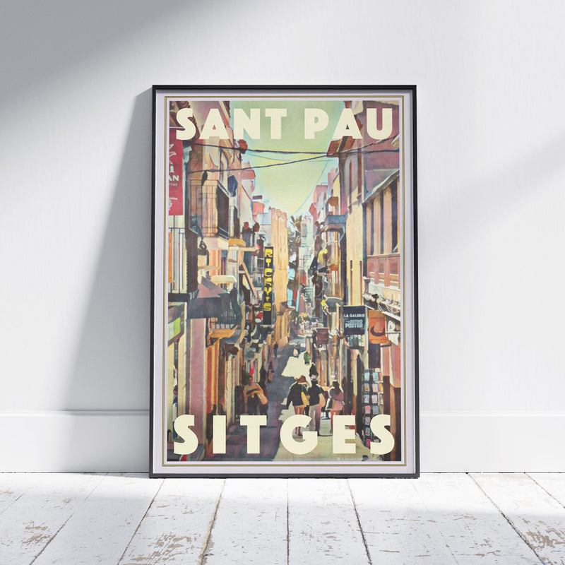 Framed Sant Pau Sitges poster by Alecse depicting the lively Mediterranean street scene in vintage tones.