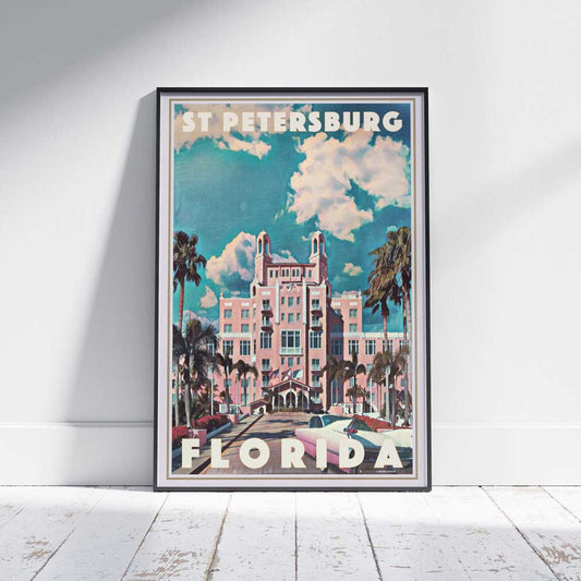 Framed St Petersburg poster on a white wooden floor featuring the historic Don CeSar Hotel