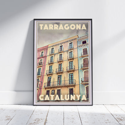 Framed Tarragona La Font poster by Alecse showing colorful Catalan facades under soft Mediterranean light.