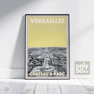 Framed poster of Versailles Chateau & Parc with a yellow background on a white wall.