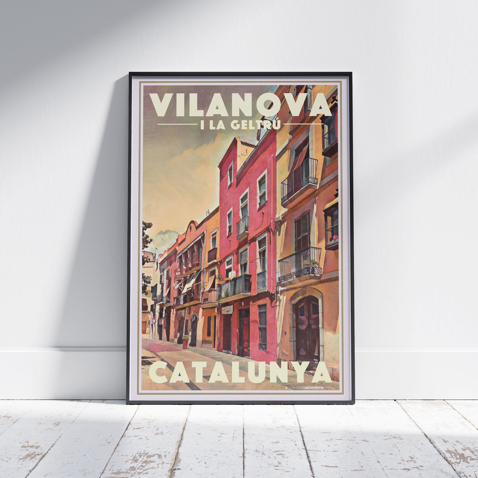 Framed Plaça Llarga Vilanova poster showing vibrant pastel buildings and afternoon light in Alecse’s vintage halftone style.