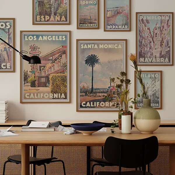 An accent wall with Original Vintage Travel Posters by Alecse