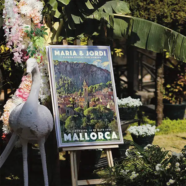 Custom wedding poster by Alecse displayed on a wooden easel in a lush garden wedding setting