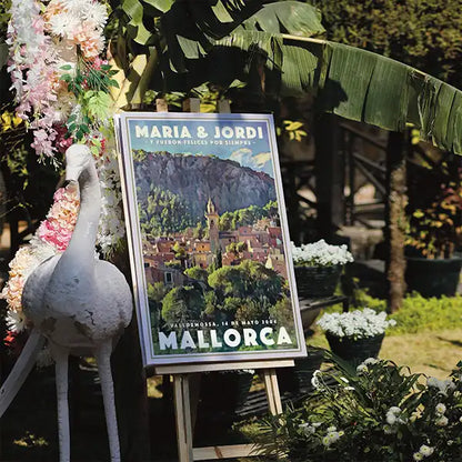 Custom wedding poster by Alecse displayed on a wooden easel in a lush garden wedding setting