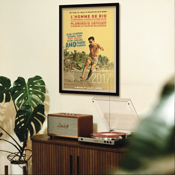 Custom movie poster by Alecse, designed as a bespoke vintage-style film poster and displayed framed in a retro-inspired interior.