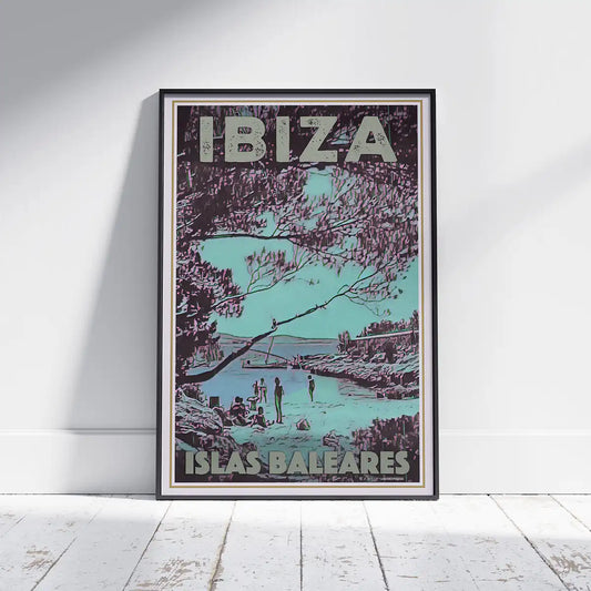 San Antonio Beach Vintage Ibiza poster by French Artist Alecse, showcased framed on a white wooden floor