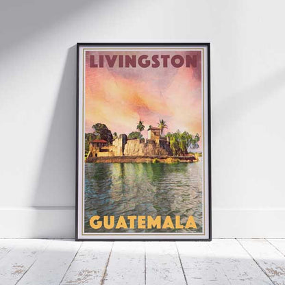 Vintage travel poster of Livingston, Guatemala, featuring the Castillo de San Felipe at sunset