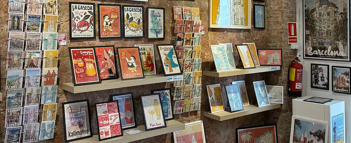 Spanish Capsule collection by artist Cha, featuring colorful retro Spanish posters and postcards displayed at the MyRetroPoster gallery in Barcelona.