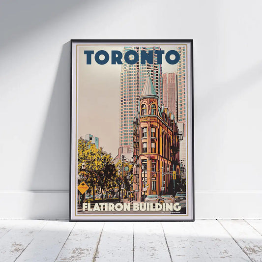 Framed Toronto Flatiron Building vintage poster displayed in a minimalist interior, architectural wall art by Alecse