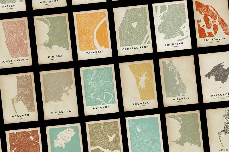 Grid of vintage-style map posters by The Wanderer Maps™ on a black background