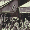 Details of the people on the terrace of Paris most famous café in St Germain des près